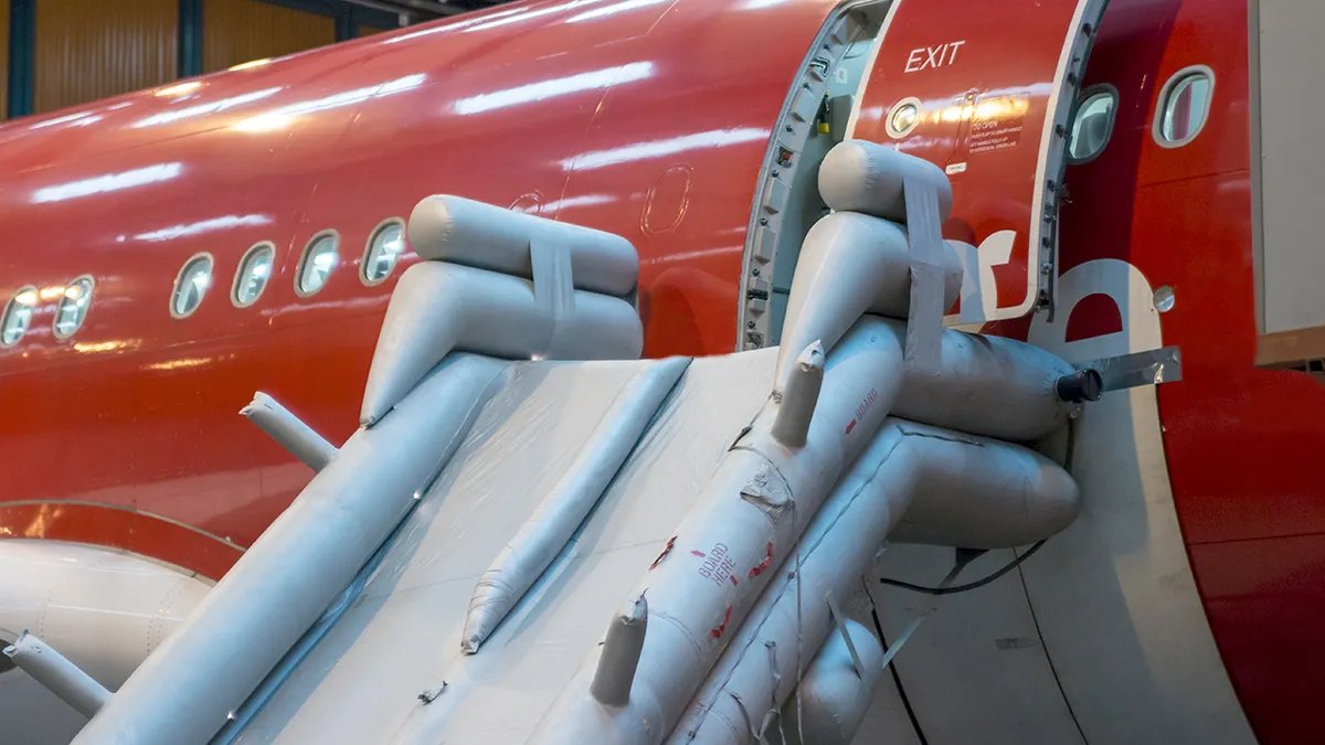 Passengers waiting at the gate after a flight delay