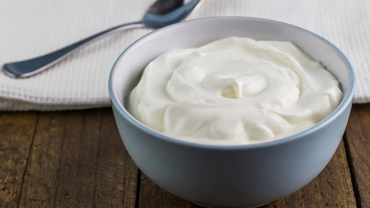 A glass of milk with a splash, emphasizing the freshness and health benefits of dairy.