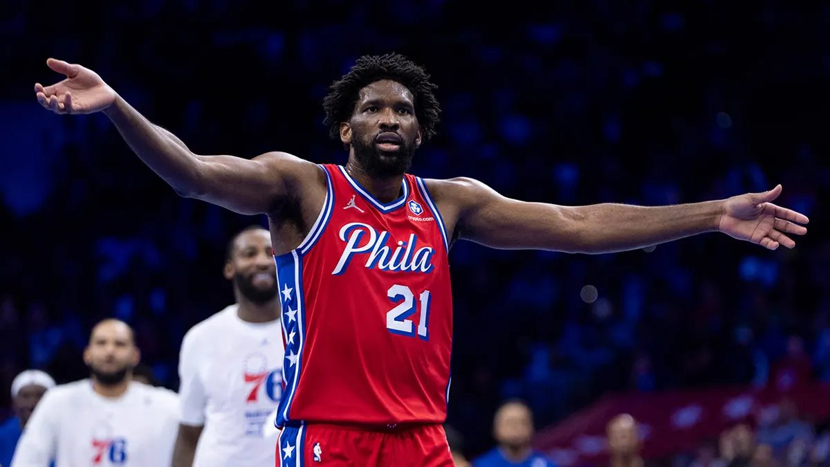 Joel Embiid speaking during a press conference about the lewd gesture fine