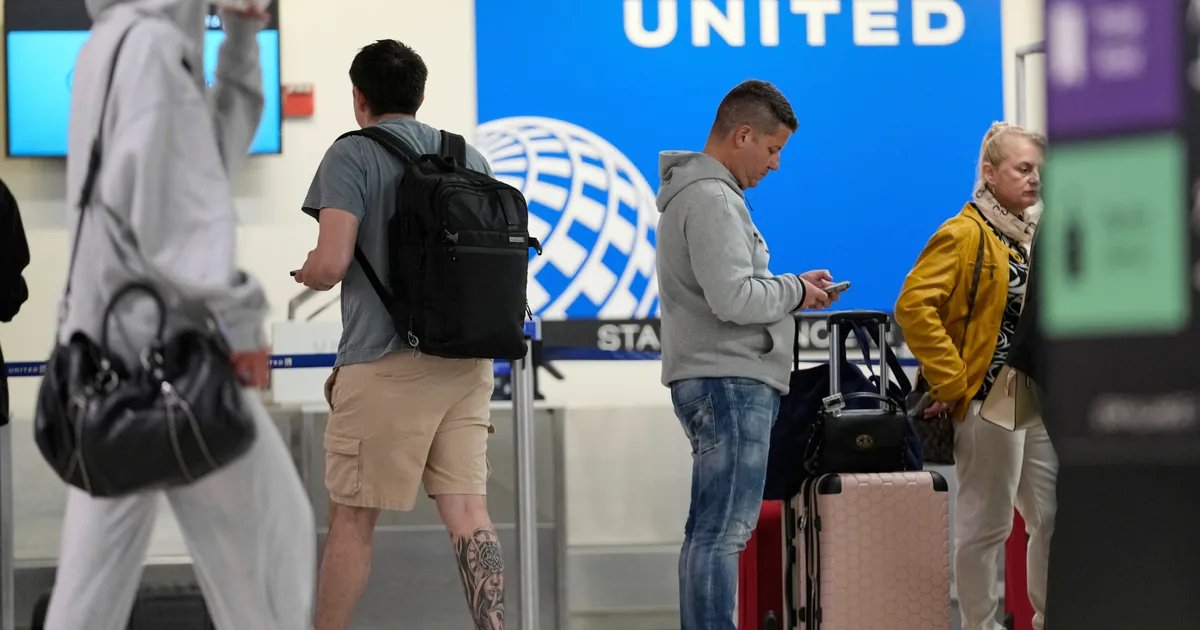 FAA tower with planes taking off, representing air traffic reduction.