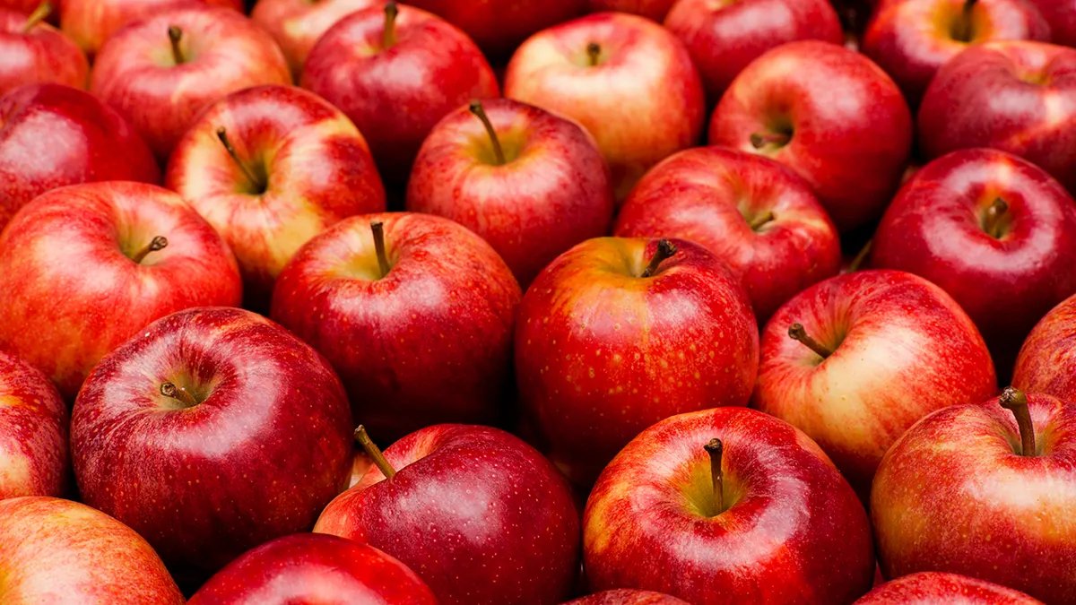 Drinking water to rinse away sugars and protect teeth.