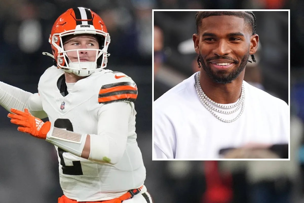 Shedeur Sanders looking disappointed on the sidelines