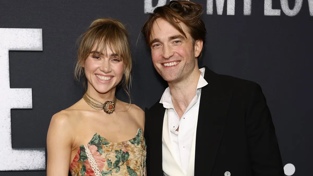 Robert Pattinson and Suki Waterhouse at an event