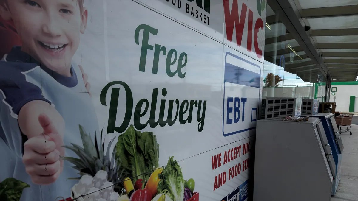Image showing a person shopping for groceries with food stamps
