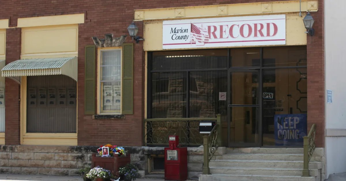 A somber view of the Marion County Record office, reflecting on the aftermath of the controversial police raid.