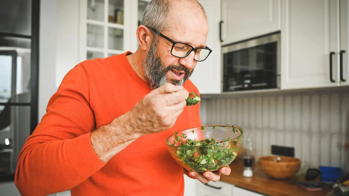 A man exercising in a gym, symbolizing the importance of physical activity in maintaining healthy testosterone levels.