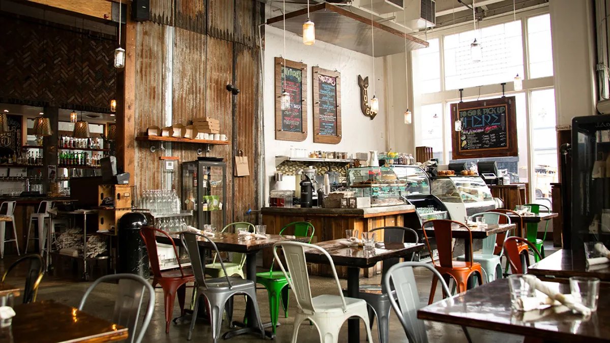A former vegan chef, now on a ranch, inspecting soil health with tools, symbolizing her new focus.