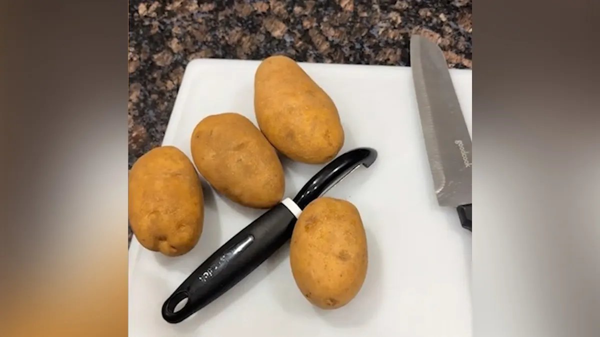 Apron worn over work clothes.