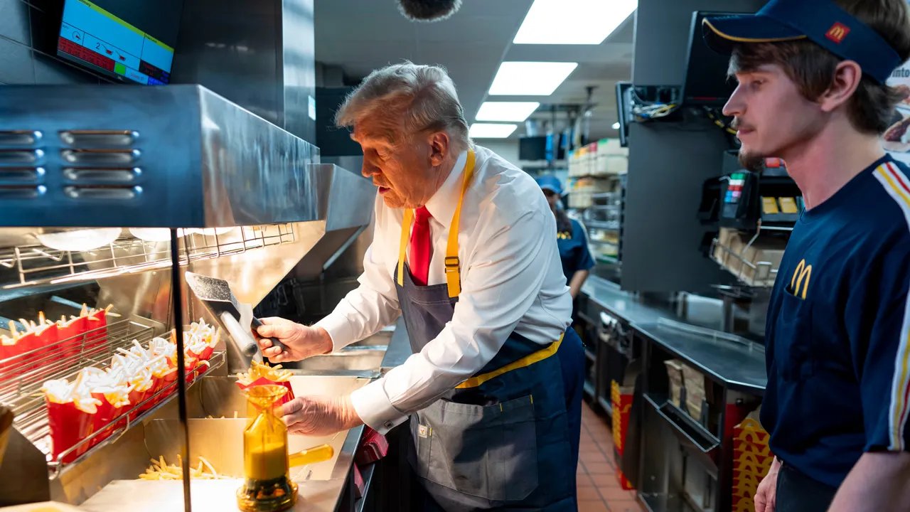 Donald Trump enjoying a fast-food meal, a frequent sight during his campaigns.