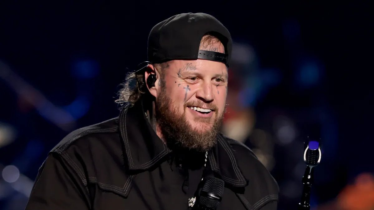 Jelly Roll reveals his clean-shaven face, looking notably younger and transformed.