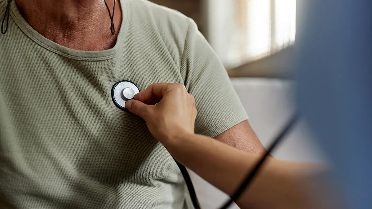 A person happily enjoying smoke-free life.