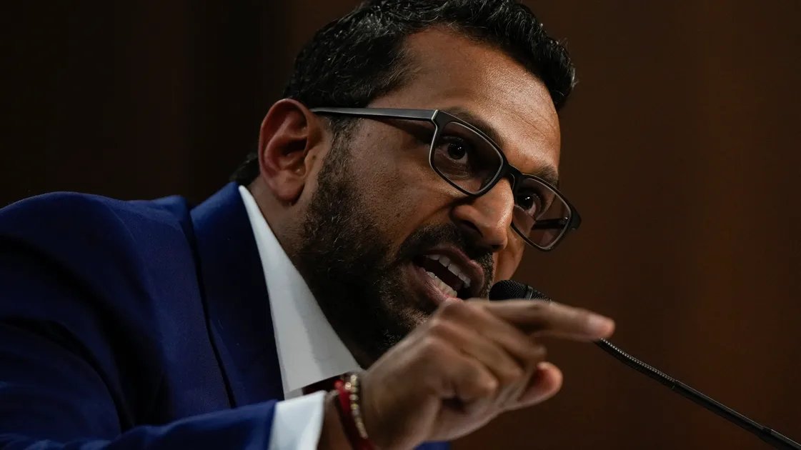 The US flag next to the LGBTQ+ pride flag are displayed together, symbolizing inclusion and diversity.