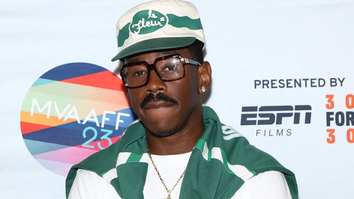 Tyler, the Creator accepting the Apple Music Artist of the Year award.