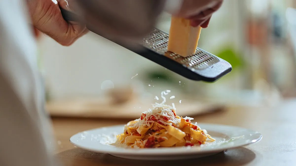 An American family enjoying a pasta dinner together.