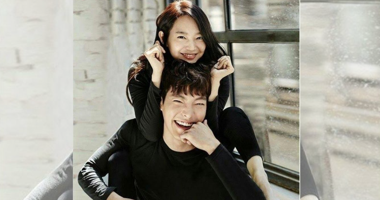 Kim Woo-bin and Shin Min-ah smiling and posing together at an event.