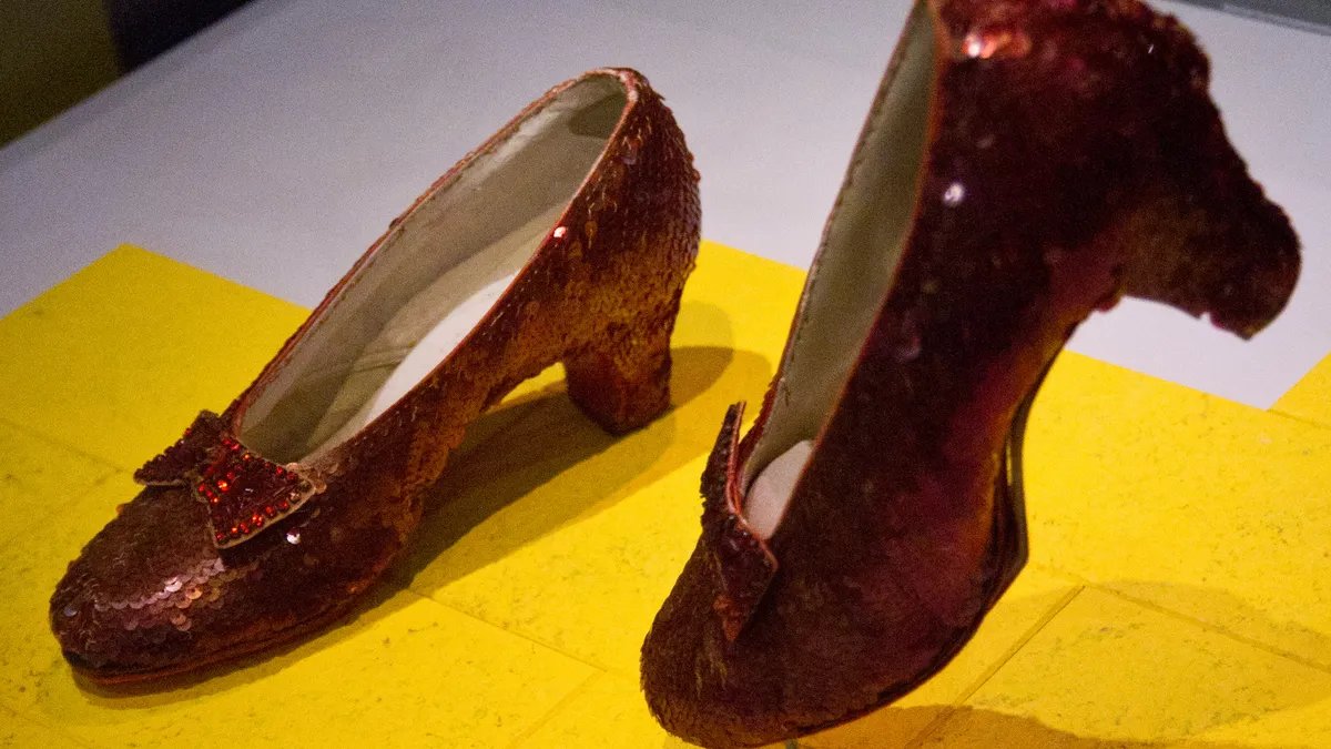 Elphaba defying gravity in Wicked, a powerful scene showcasing her fight for justice.