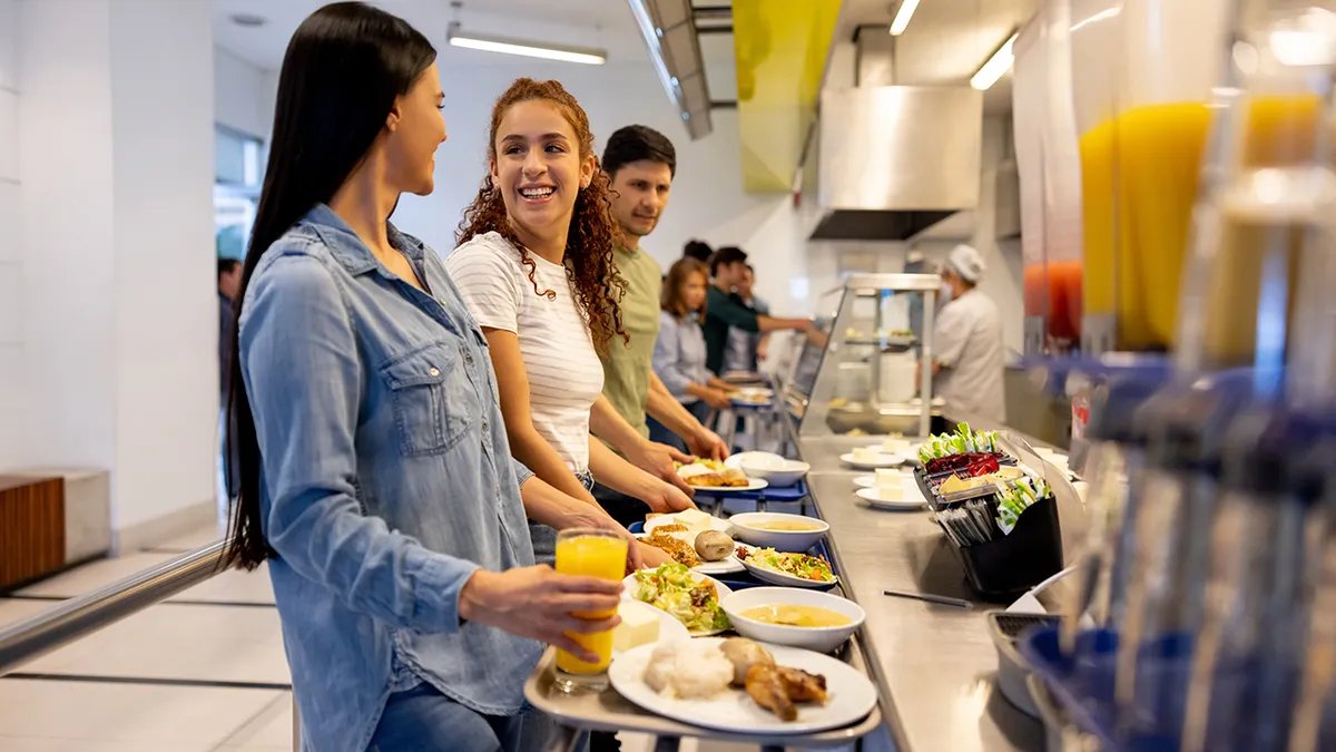 A young adult preparing a healthy meal, symbolizing empowerment through cooking.