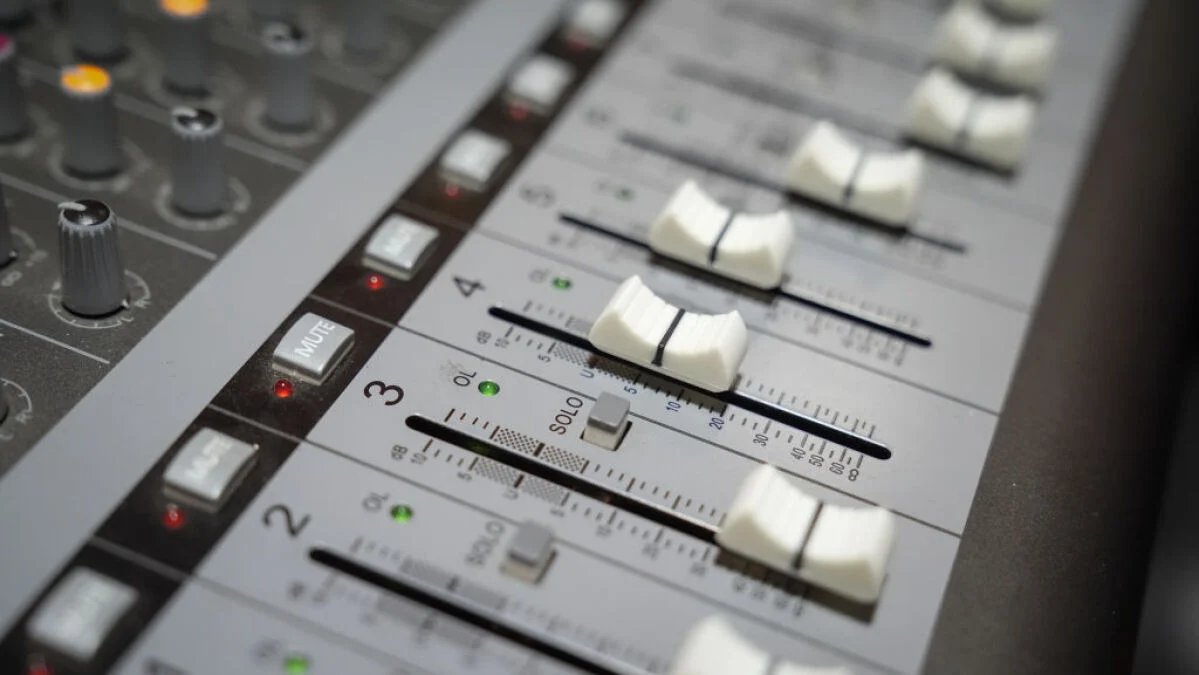 A screenshot of the Udio AI music generation interface, showing a creation prompt and music controls.