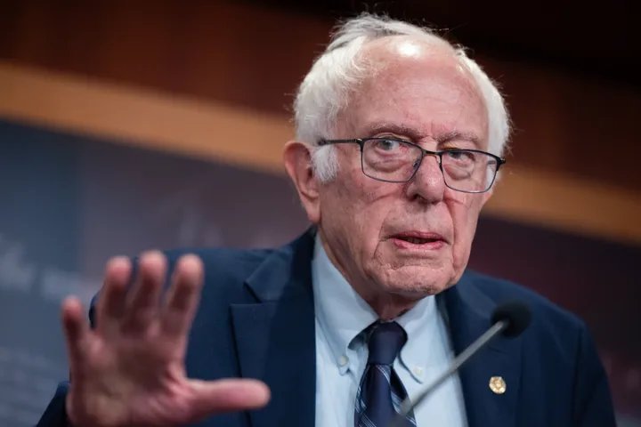 A group of diverse voters engaging in a community discussion, illustrating grassroots political engagement.