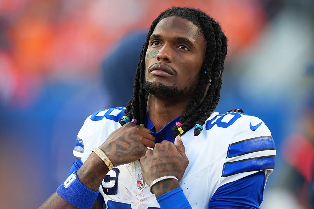 CeeDee Lamb on the field, looking focused.