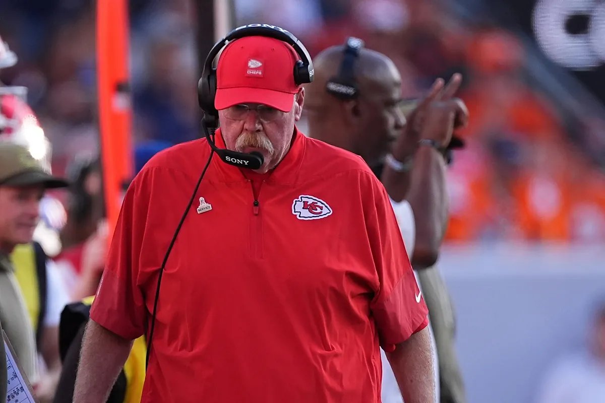 Patrick Mahomes looking dejected on the sidelines during the Chiefs-Cowboys game.