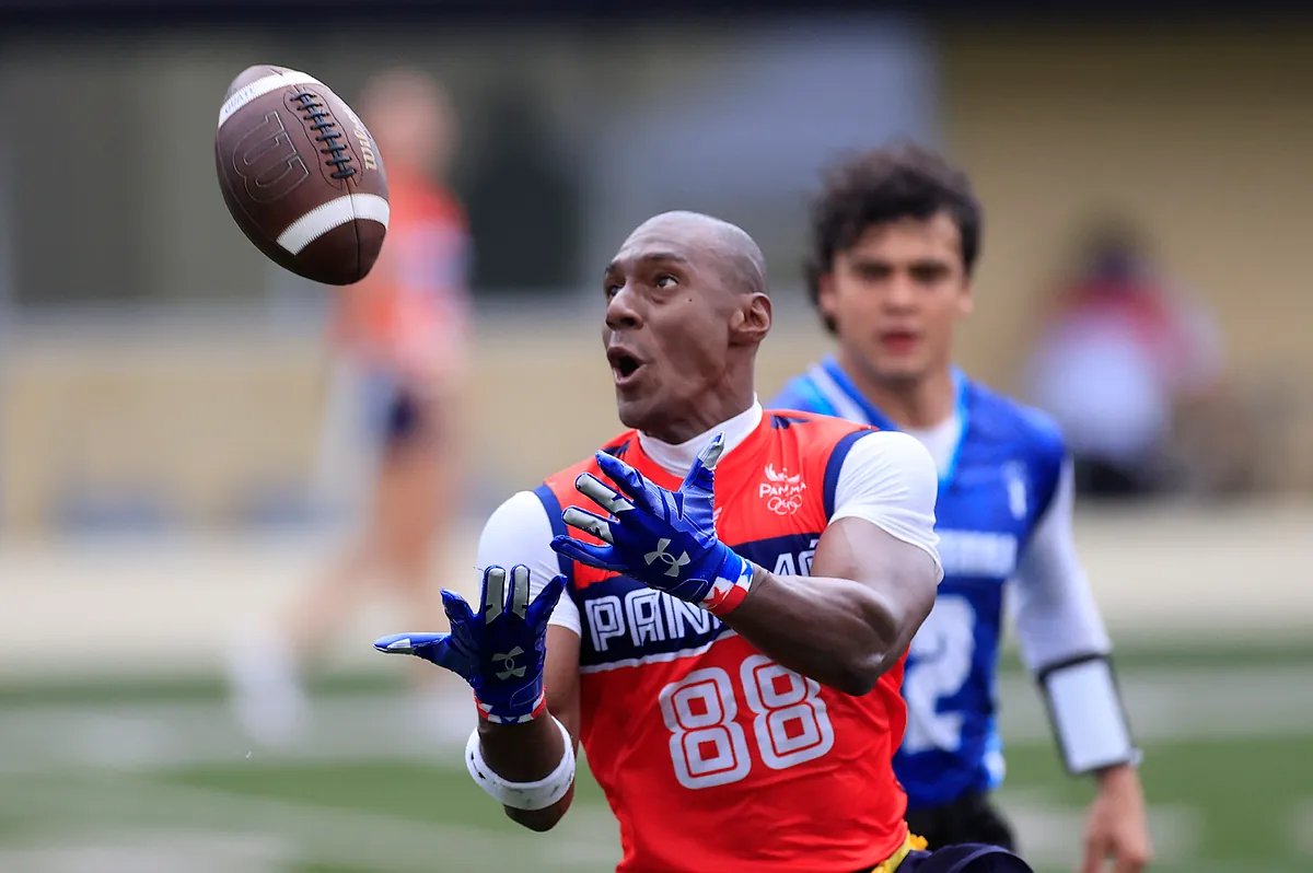 Flag football athletes in action during a game.