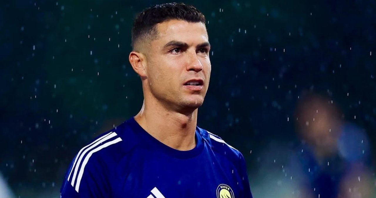 Cristiano Ronaldo playing for Al Nassr, looking focused and determined on the pitch.