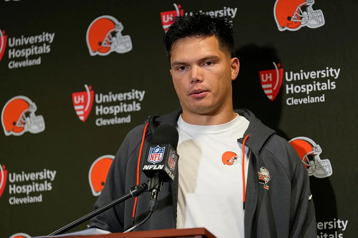 Zo Caswell with Dillon, looking at each other.