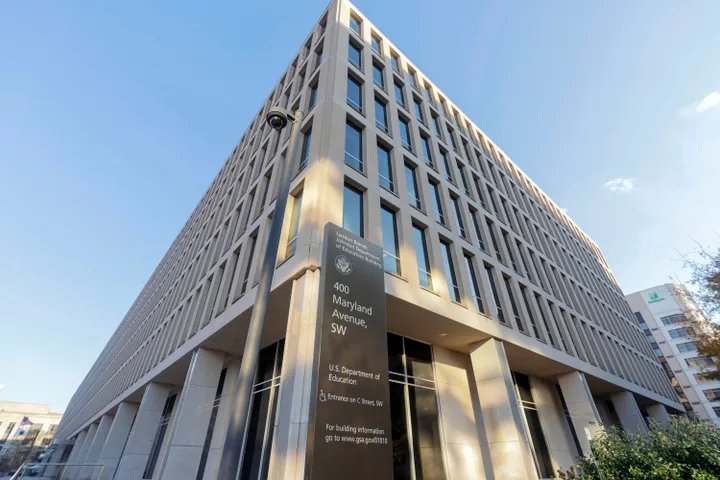 Classroom with diverse students learning.