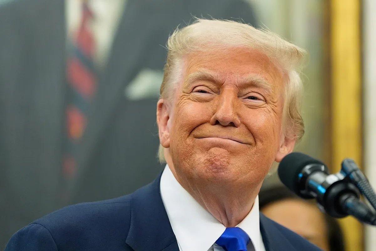 Donald Trump waving to a crowd, suggesting his continued political presence and popularity.