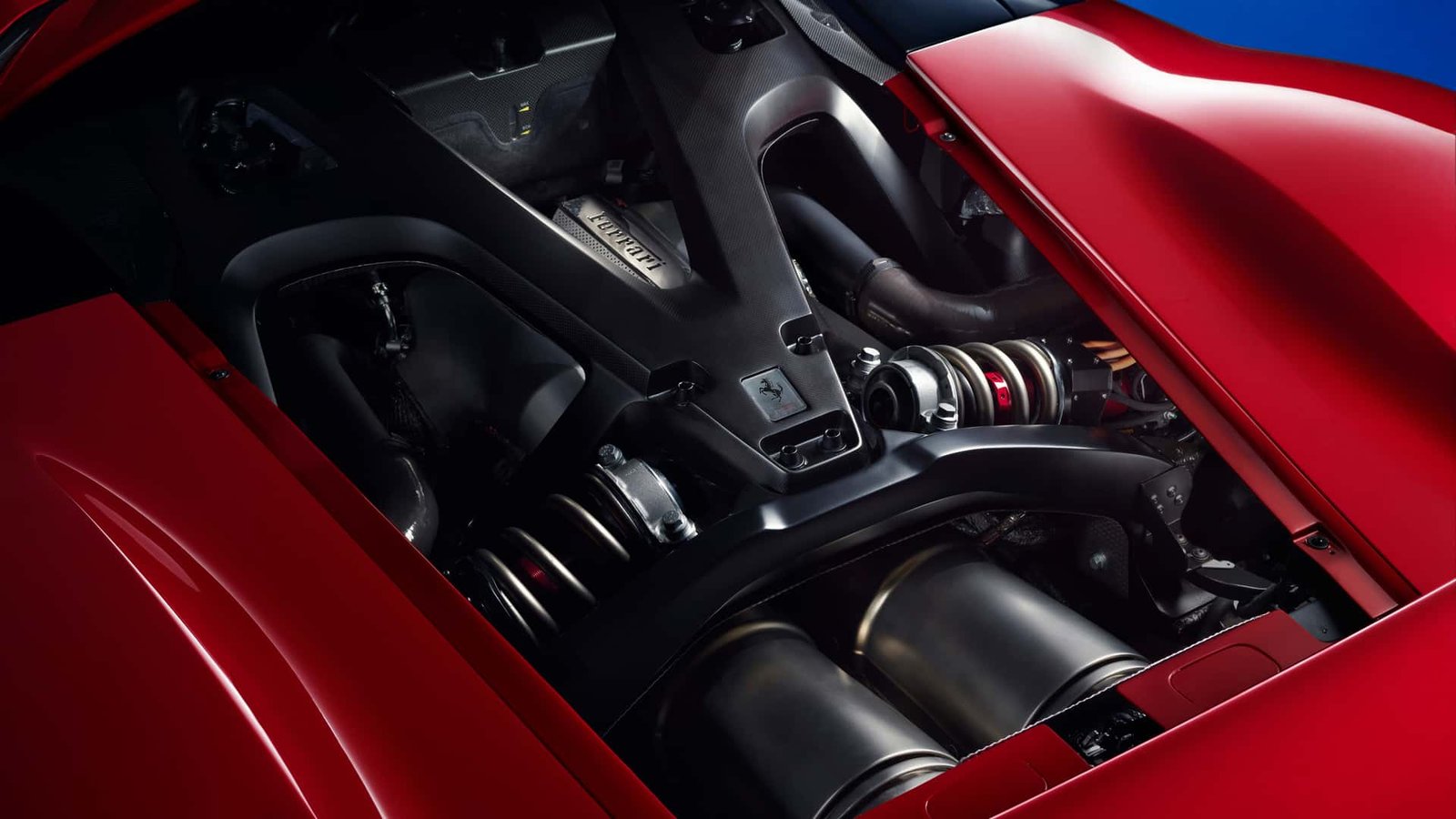 A powerful Ferrari V12 engine block, showcasing intricate engineering and performance components.