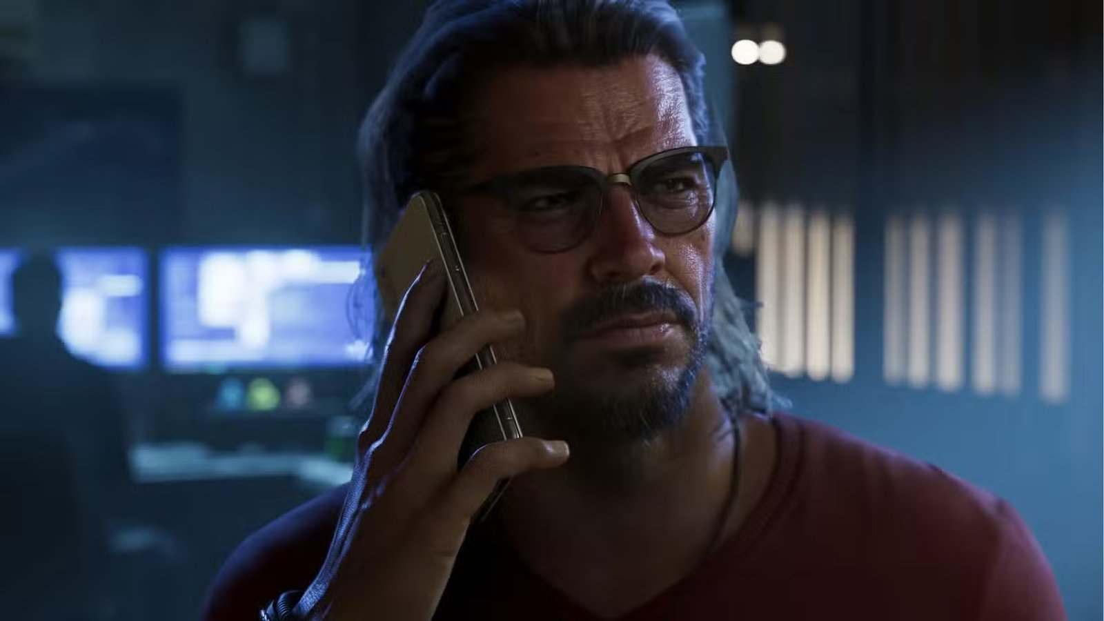 A close-up of a smartphone screen displaying a suspicious website claiming to host a GTA 6 trailer, with a prominent 'download now' button.