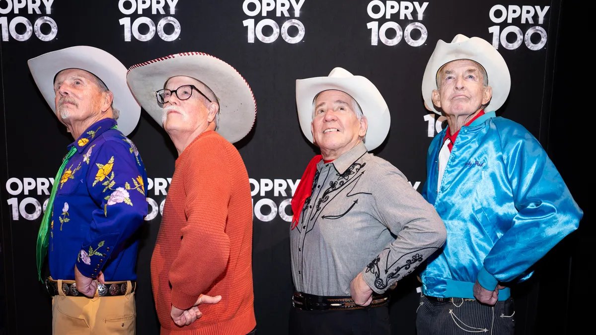 The Grand Ole Opry lit up at night during its centennial celebration.