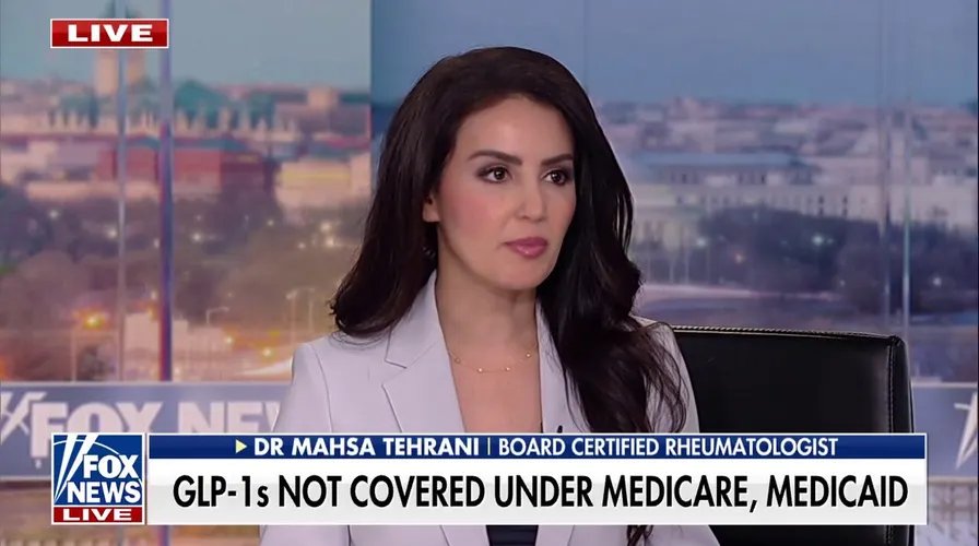A doctor explaining a diagram of the inner ear to a patient, emphasizing the cochlea and hair cells, symbolizing the hope for new treatments.