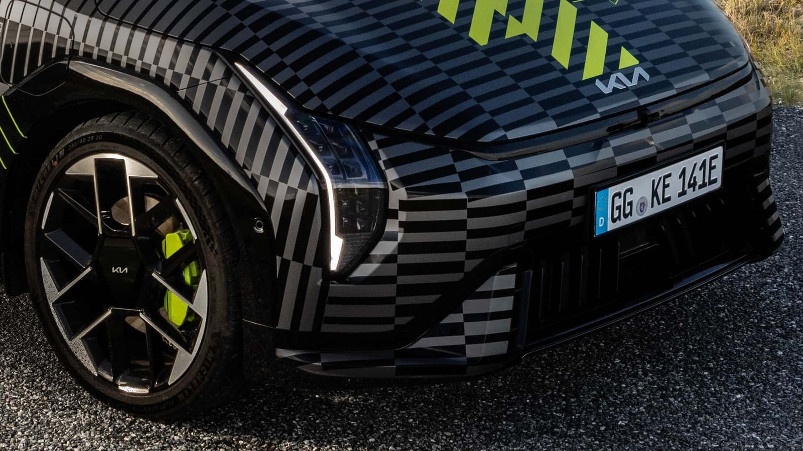 Kia EV4 GT prototype in camouflage, hinting at sporty design