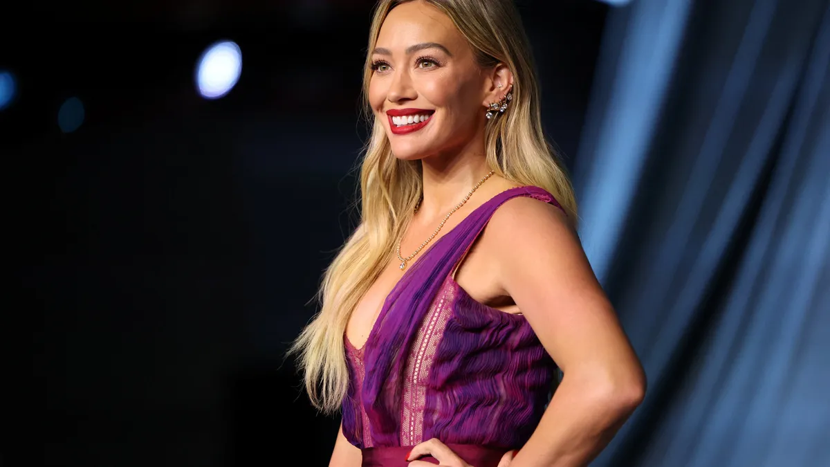 Hilary Duff smiles, looking forward to her 2026 album release