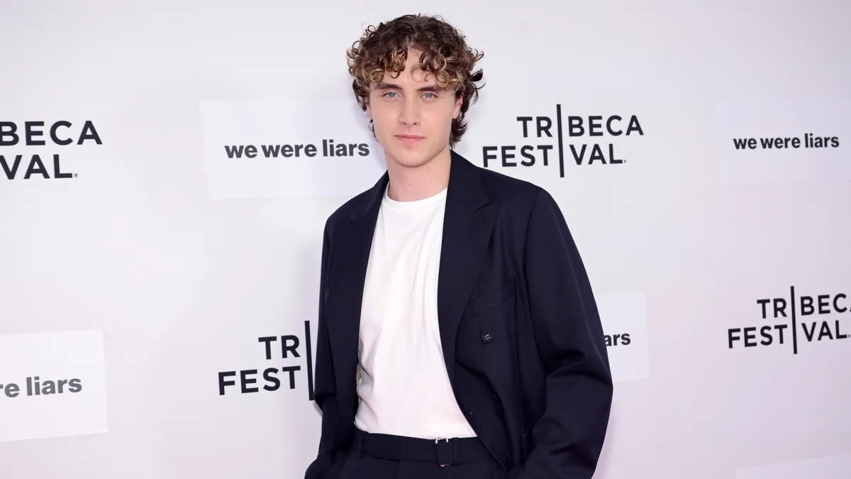 A still from the 'Sunrise on the Reaping' trailer showing a tense moment in the arena.