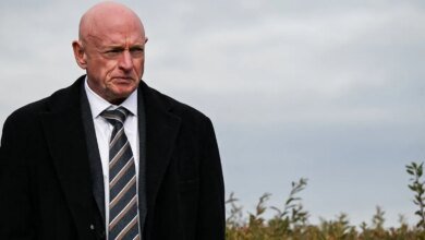 'I will not be intimidated,' Sen. Mark Kelly says of Trump's threats