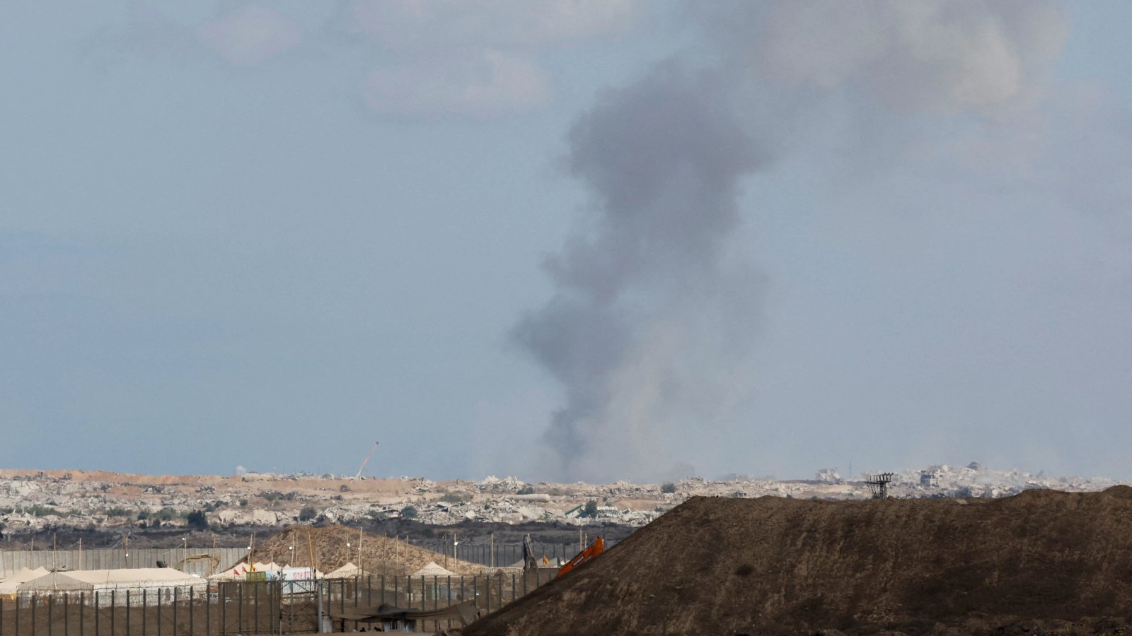 Smoke rising from a building after an airstrike in a residential area of Beirut.