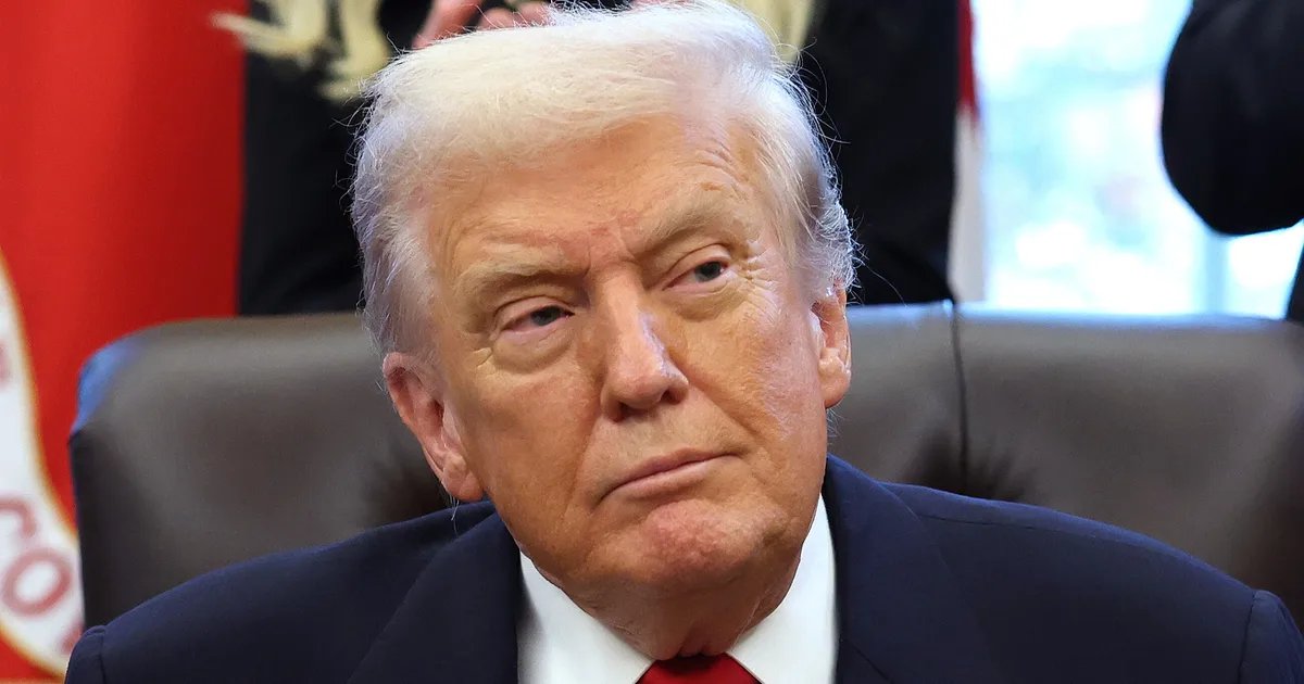 Donald Trump speaking at a rally, with a concerned expression on his face.