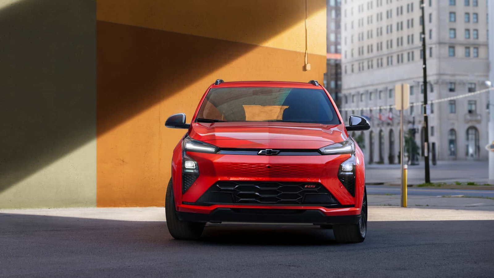 A sleek, modern electric concept car from GM, showcasing the future of affordable electric vehicles.