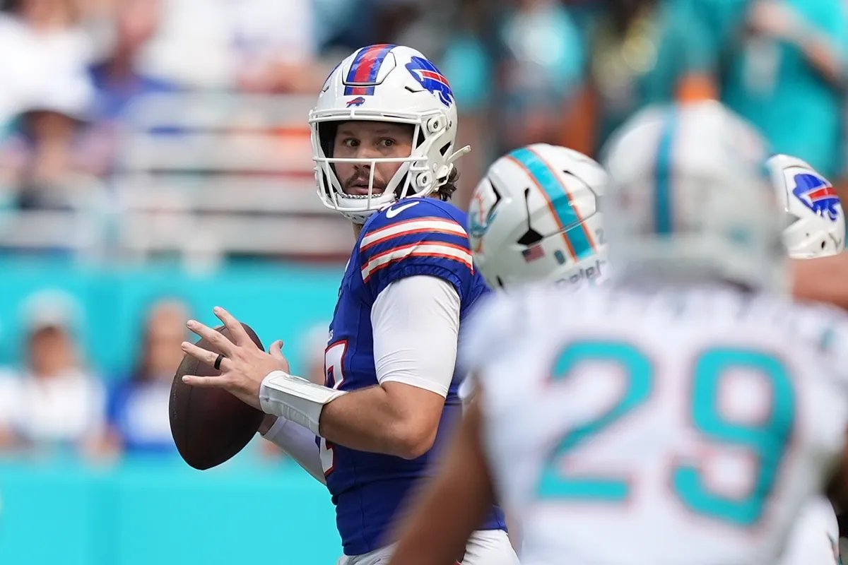 Josh Allen rushing against the Miami Dolphins defense