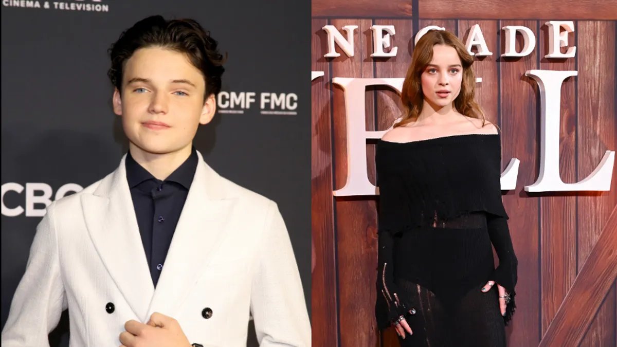 A blurry, leaked photo showing what appears to be Link and Zelda standing side-by-side.