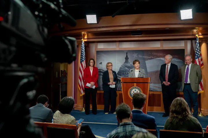 The Capitol Building at dusk, symbolizing the political gridlock and uncertainty surrounding government funding.