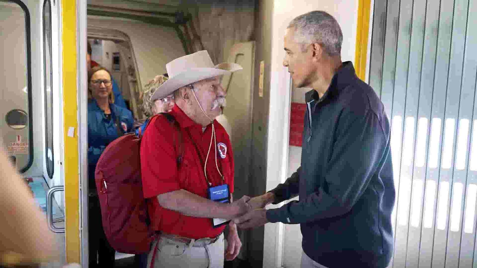 Former President Barack Obama warmly greeting a veteran during his surprise visit to Washington D.C.