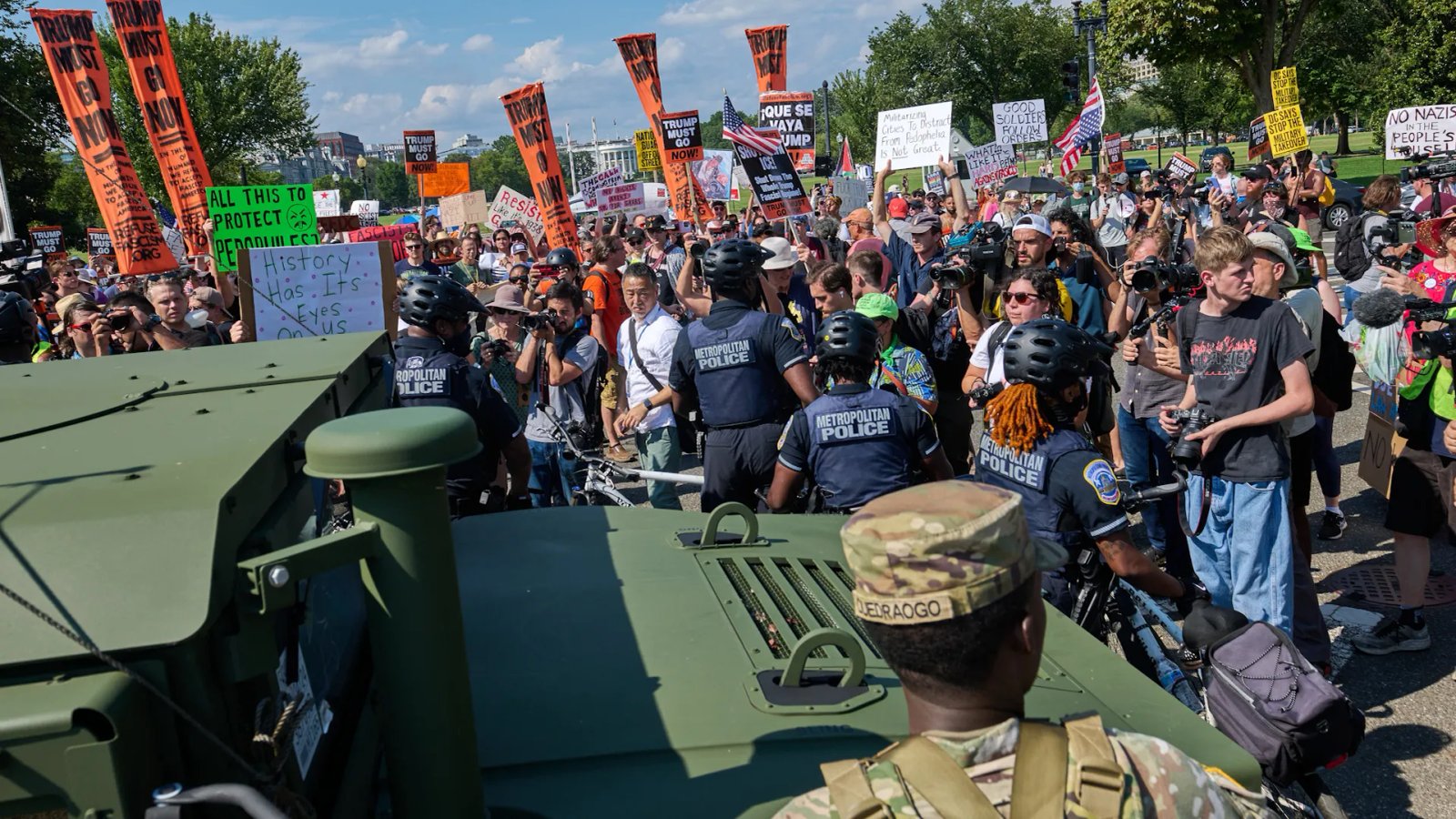 A close-up shot of the Supreme Court of the United States building, with its grand columns and 'EQUAL JUSTICE UNDER LAW' inscription prominently visible. The sky above is clear, suggesting a moment of clarity or a weighty decision.