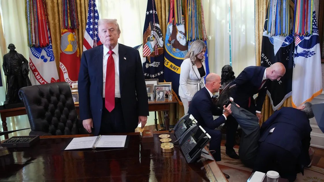 Donald Trump observing a medical emergency in the Oval Office