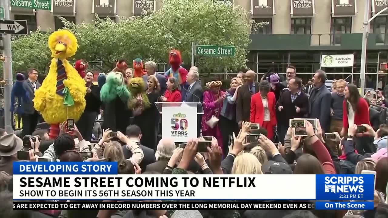 A child watching Sesame Street on a tablet, highlighting the shift to streaming platforms.