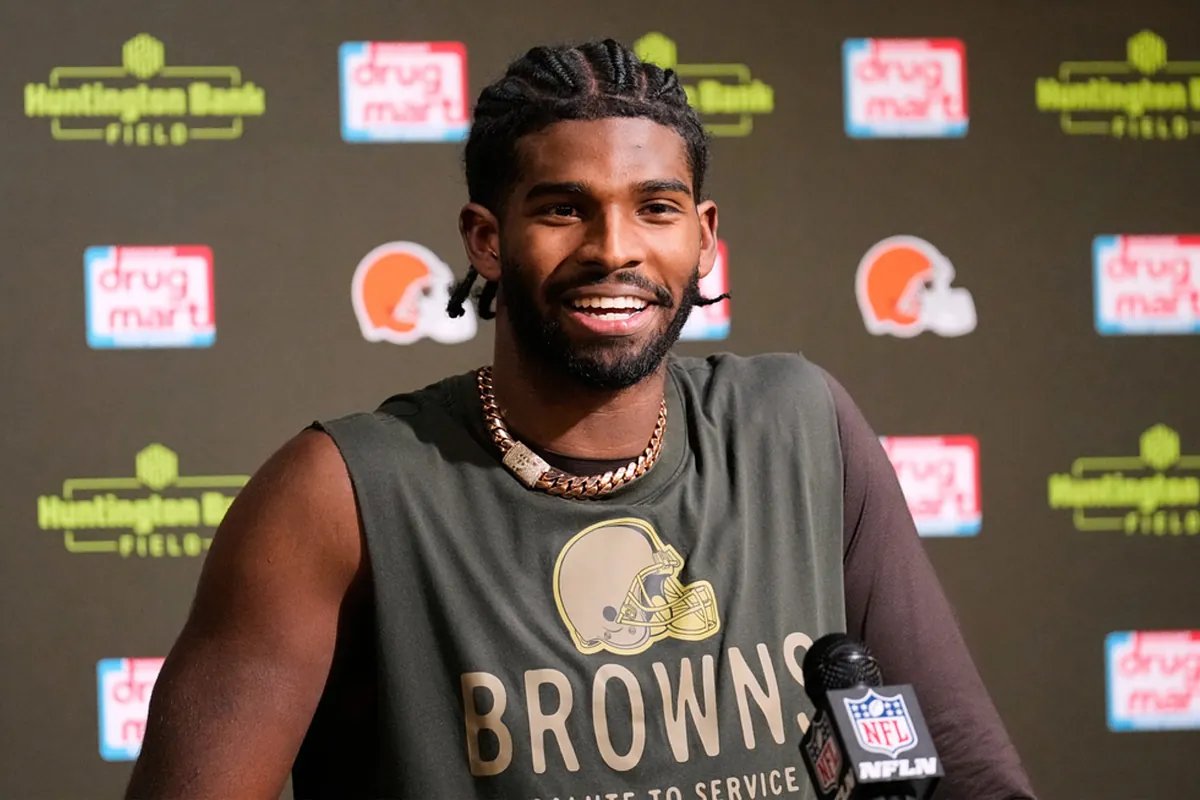 Shedeur Sanders looking focused during a practice session.