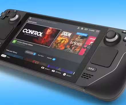 A gamer engrossed in playing on their Steam Deck.